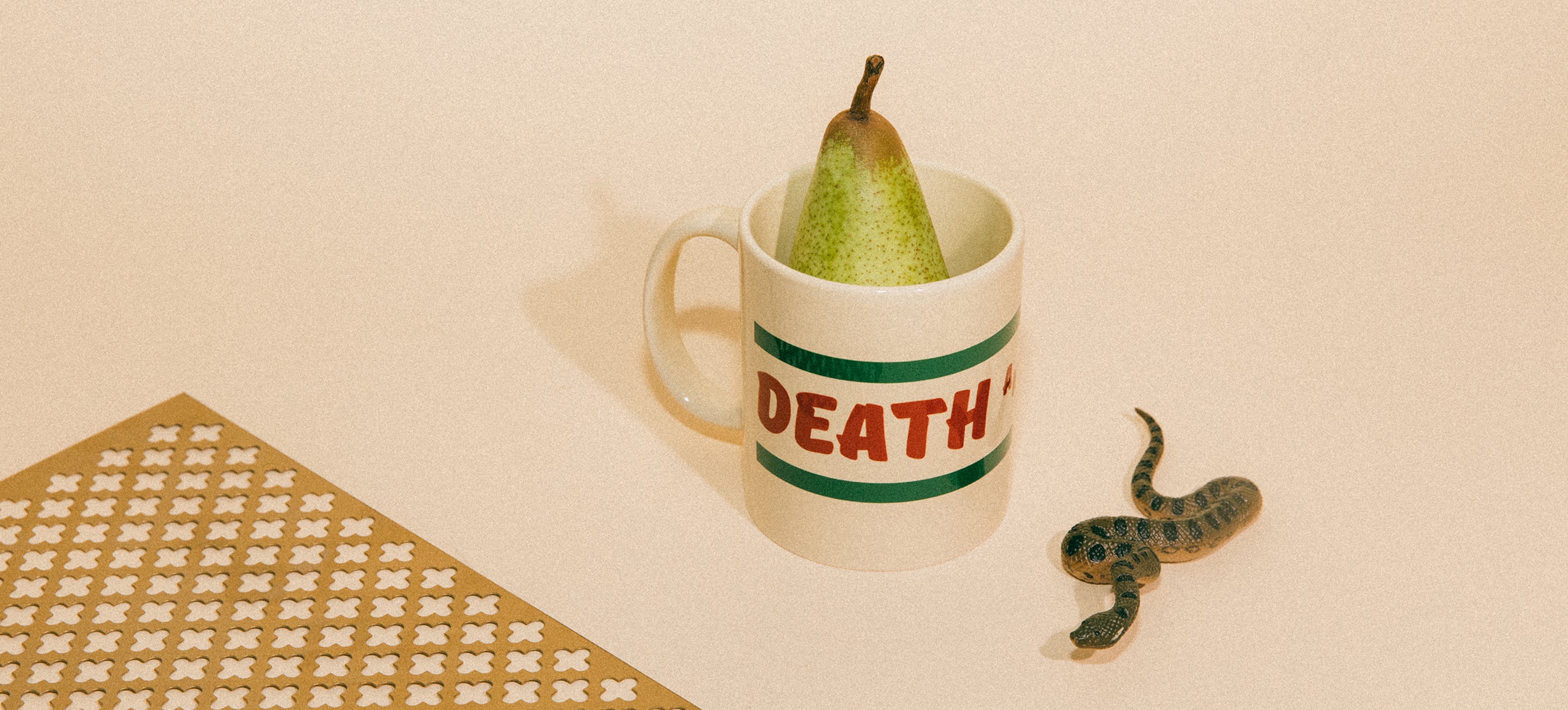 Death and Time Mug by Hungry Ghost Press with pear inside of it