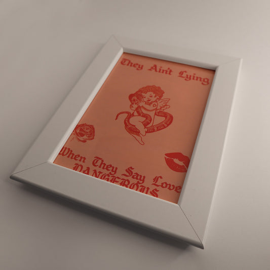 Love Is Dangerous Framed Print